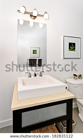 Interior bathroom vanity and mirror - artwork on walls are from photographer portfolio