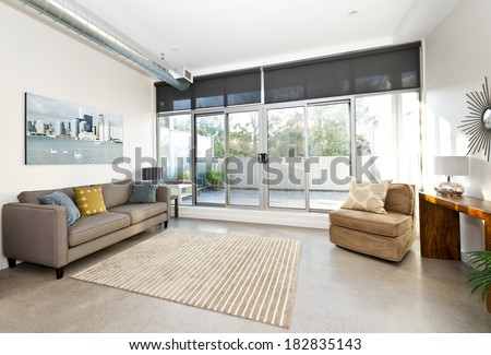 Living room with sliding glass door to balcony - artwork from photographer portfolio