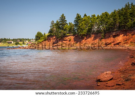 Red cliffs of Prince Edward Island Atlantic coast near Cavendish, PEI, Canada.