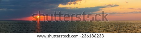 Panoramic sunset with dramatic  sky over Atlantic Ocean in Prince Edward Island, Canada
