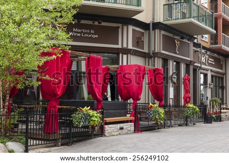 COLLINGWOOD, ON, CANADA - JUNE 18: Summer view of Twist Martini & Wine Lounge patio in Blue Mountain Village, 2014