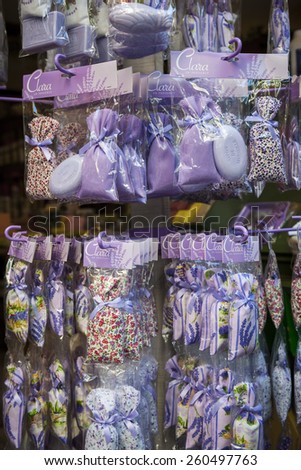 NICE, FRANCE - OCTOBER 2, 2014: Lavender sachets and soaps are sold as souvenirs on Rue Pairoliere, a quaint pedestrian shopping street in old Nice.