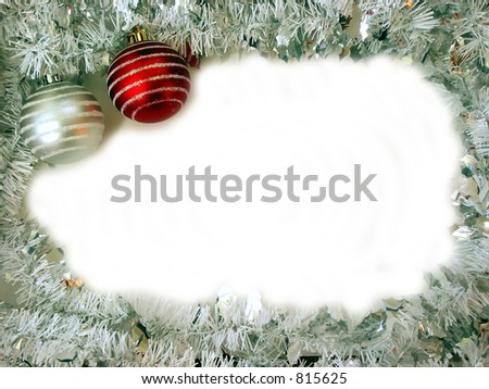 Christmas frame with two glass ball ornaments and white space for text