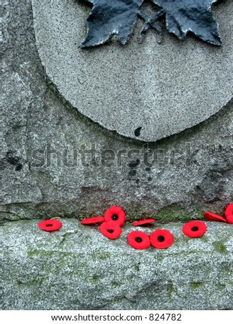 Poppies on the war memorial on Remembrance day