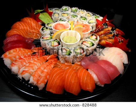 Party tray of sushi and rolls