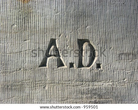 Letters A.D. - Anno Domini on the wall of an old church