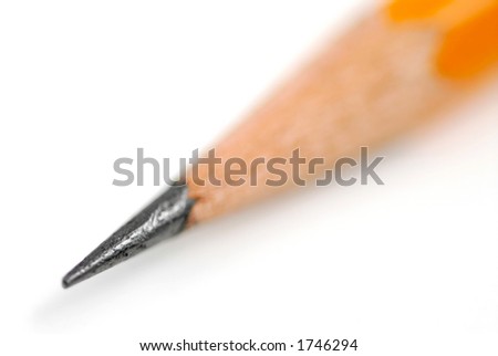 Tip of a sharp pencil on white background, shallow dof