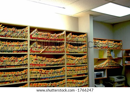 Medical files with patient information in doctor\'s office