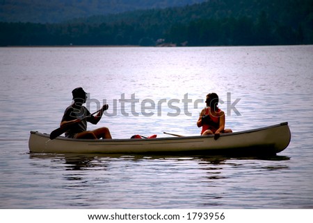 Couple in a canoe on a lake