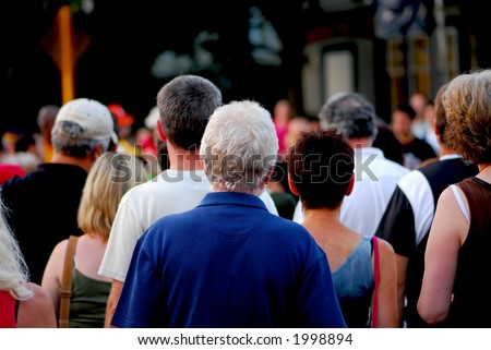 Crowd of people on busy city street