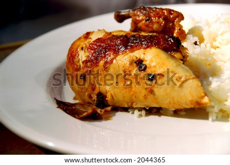 Dinner of roasted chicken and white rice