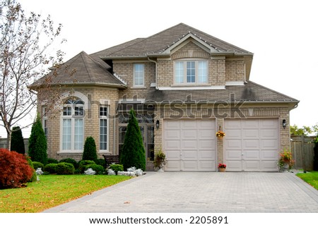 New detached single family luxury home with brick facade