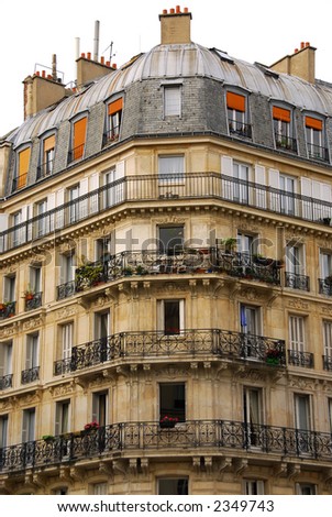 Old apartment buildings with wrought iron balconies in Paris France