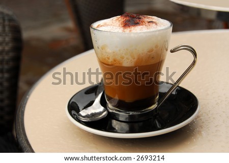 Cup of coffee on outdoor patio table