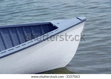 Nose of a blue wooden boat closeup