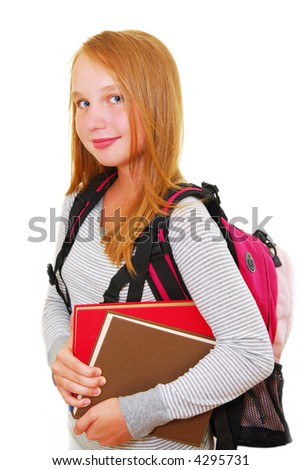 stock photo Young smiling school girl with backpack and books isolated on 