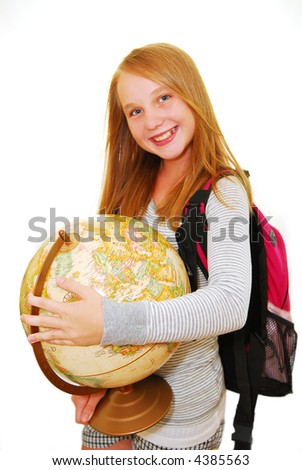 stock photo Young smiling school girl with backpack and globe isolated on 
