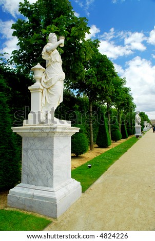 Statue on a path of Versailles garden, France