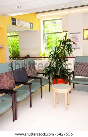 Waiting room in a hospital or clinic with empty chairs