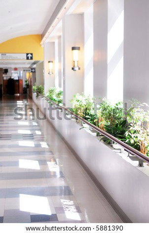 Hospital corridor leading to a reception area
