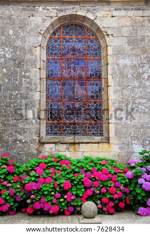Stained glass church window in Carnac, Brittany, France.