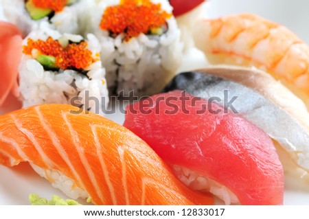 Sushi and california rolls on a plate macro