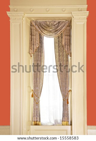 Dressed window with curtains in luxury home