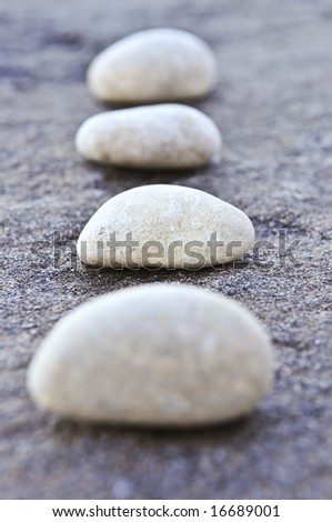 Small stones on a surface of big rock