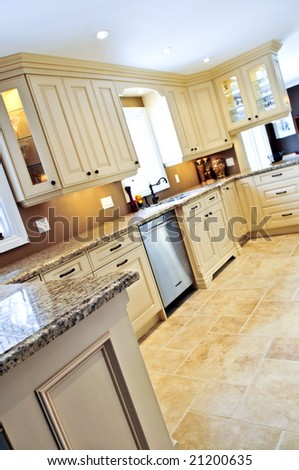 Modern luxury kitchen with ceramic tile floor