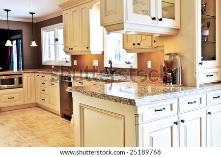 Interior of modern luxury kitchen with granite countertop