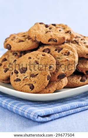 Plate with big pile of chocolate chip cookies