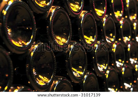 Large stack of wine bottle bottoms in winery