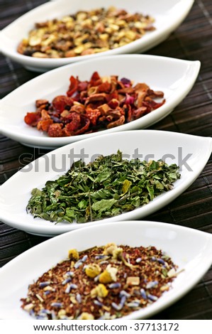 Herbal wellness dried tea in four bowls
