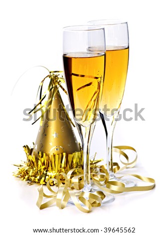Two full champagne flutes with party hat and ribbon isolated on white background