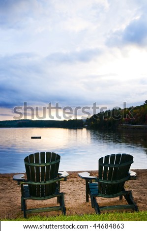 chairs on beach. Two wooden chairs on each