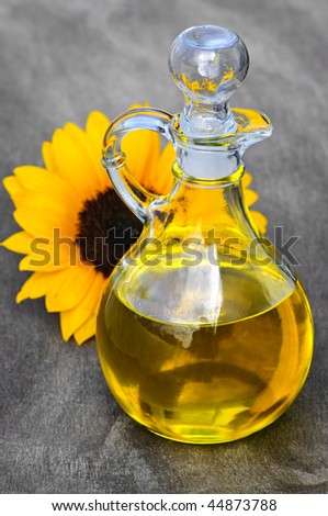 Sunflower oil bottle with stopper and flower