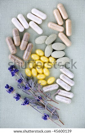 Mix of herbal supplements and vitamin pills