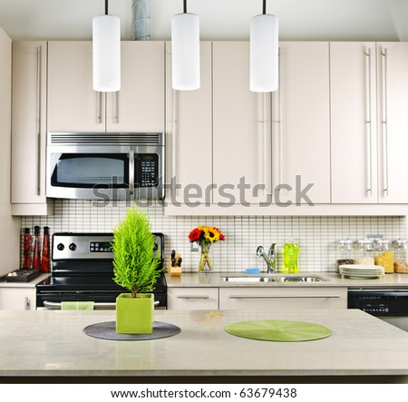 Modern kitchen interior with natural stone countertop Modern kitchen interior with natural stone countertop