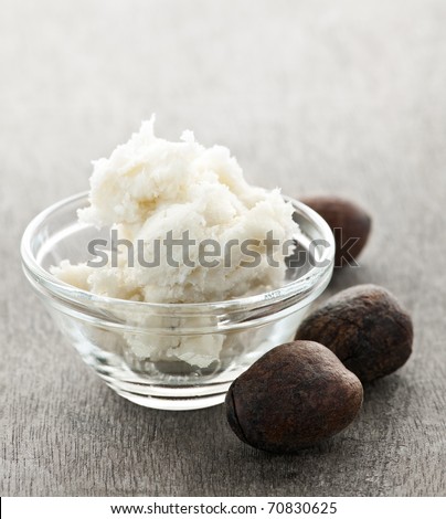 Shea nuts and sheabutter in glass bowl
