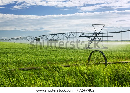 Industrial irrigation equipment on farm field in Saskatchewan, Canada