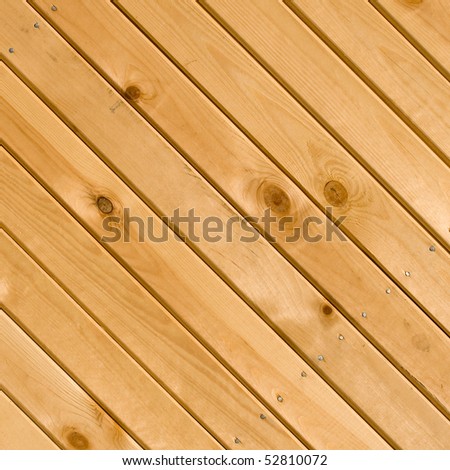Wood boards texture with nail-head. Diagonal