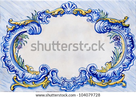 Old ceramic white, blue and yellow glazed tile frame.
