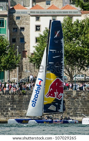 PORTO, PORTUGAL - JULY 07: Red Bull Sailing Team compete in the Extreme Sailing Series boat race on july 07, 2012 in Porto, Portugal.