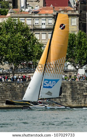 PORTO, PORTUGAL - JULY 07: SAP Extreme Sailing Team compete in the Extreme Sailing Series boat race on july 07, 2012 in Porto, Portugal.
