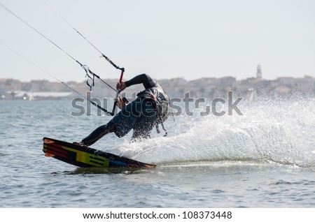 ILHAVO, PORTUGAL - JULY 21: Unidentified rider in the 3rd Kiteloop Contest Aveiro 2012 on july 21, 2012 in Ilhavo, Portugal.