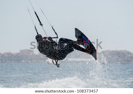 ILHAVO, PORTUGAL - JULY 21: Unidentified rider in the 3rd Kiteloop Contest Aveiro 2012 on july 21, 2012 in Ilhavo, Portugal.