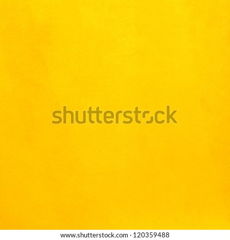 Closeup on yellow leather background.