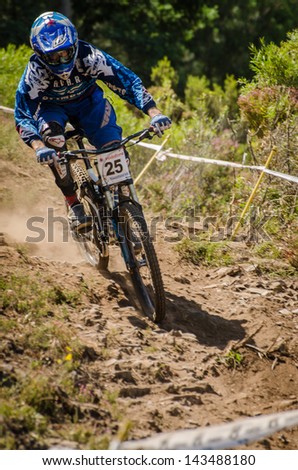 GOIS, PORTUGAL - JUNE 23: Tome Lopes during the 4th Stage of the Taca de Portugal Downhill Vodafone on june 23, 2013 in Gois, Portugal.