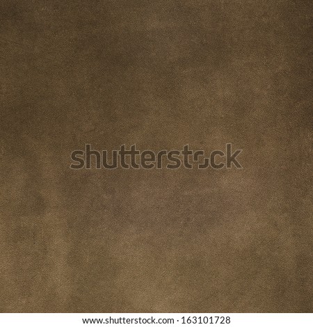 Closeup detail of brown suede texture background.