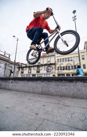 PORTO, PORTUGAL - OCTOBER 12, 2014: Helder Oliveira during the Art Over Bar x Metro Bikes Oporto Street Jam 2014.